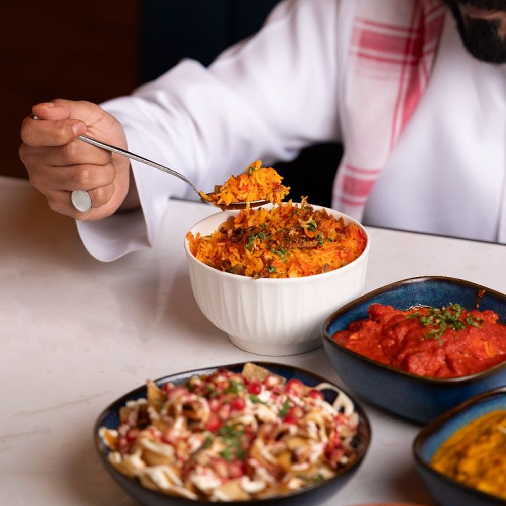 Traditional Arabic meal served with rice and flavorful curries