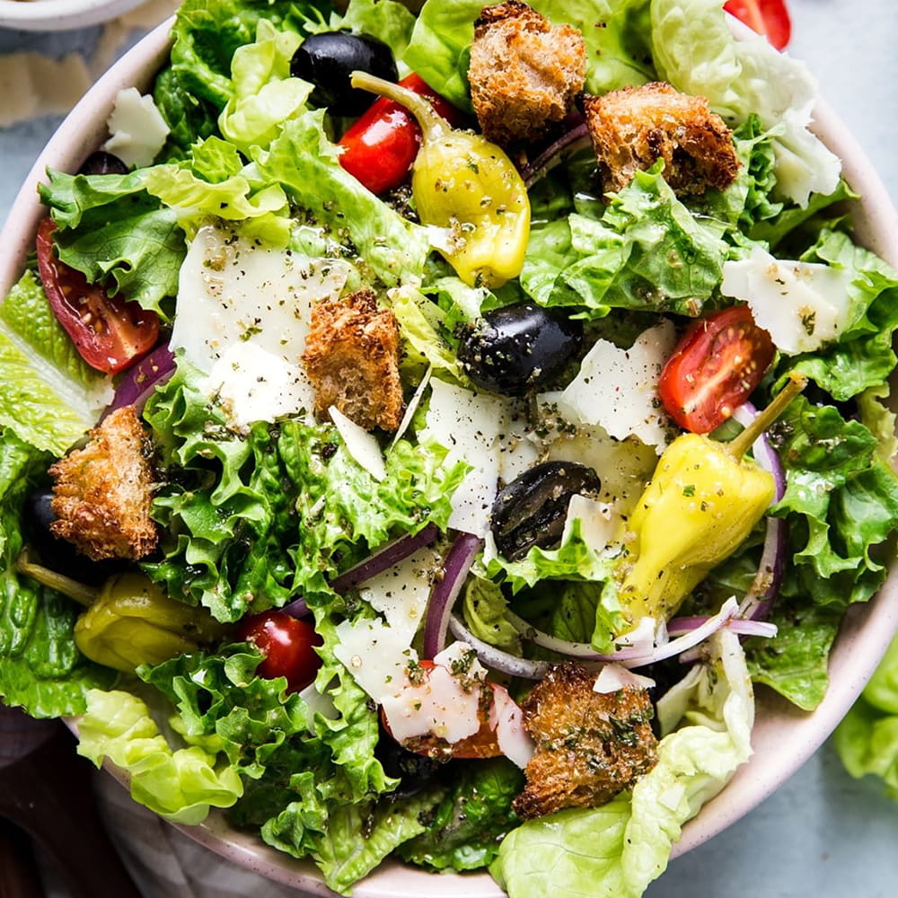 Fresh garden salad with olives, croutons, and parmesan cheese