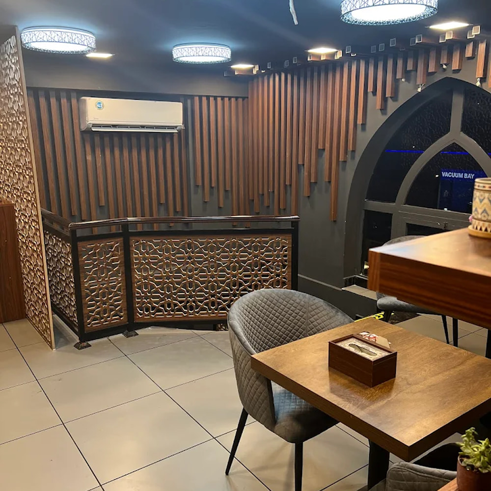 Modern restaurant interior with wooden decor and cozy seating